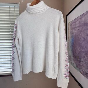 Covington White Turtleneck Sweater with snowflakes embroidery & embellishment